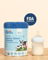 A can of Nara's Organic Whole Milk Infant Formula and a filled bottle, side by side, with an FDA Registered logo in the background.